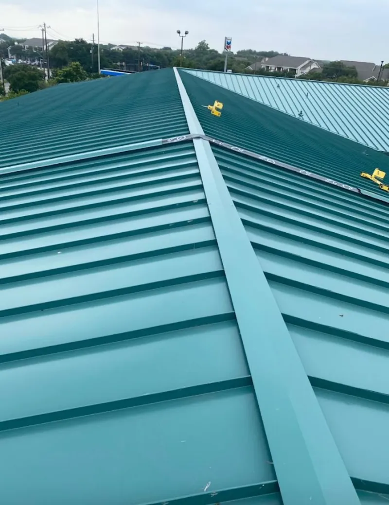 Green commercial metal roof ridge and valley for Metal Roof Repair in Northport